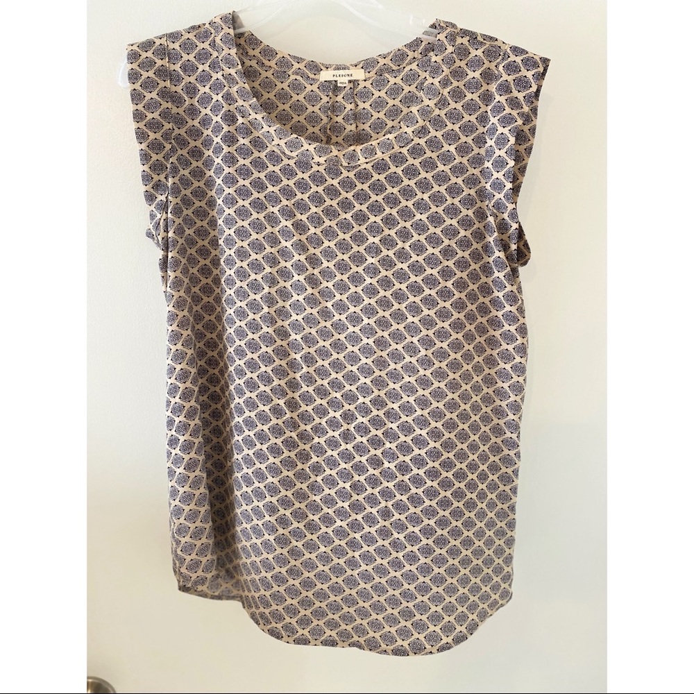 Cream blouse with navy blue detail